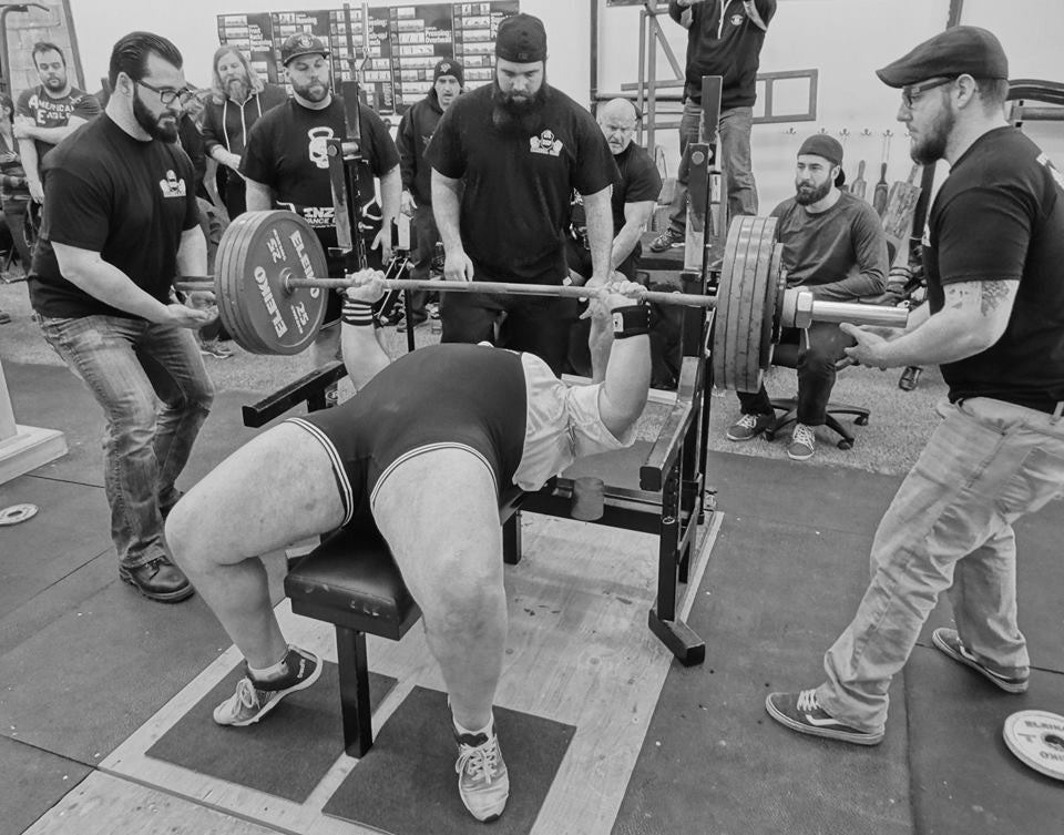 Register for a powerlifting meet and watch your training explode